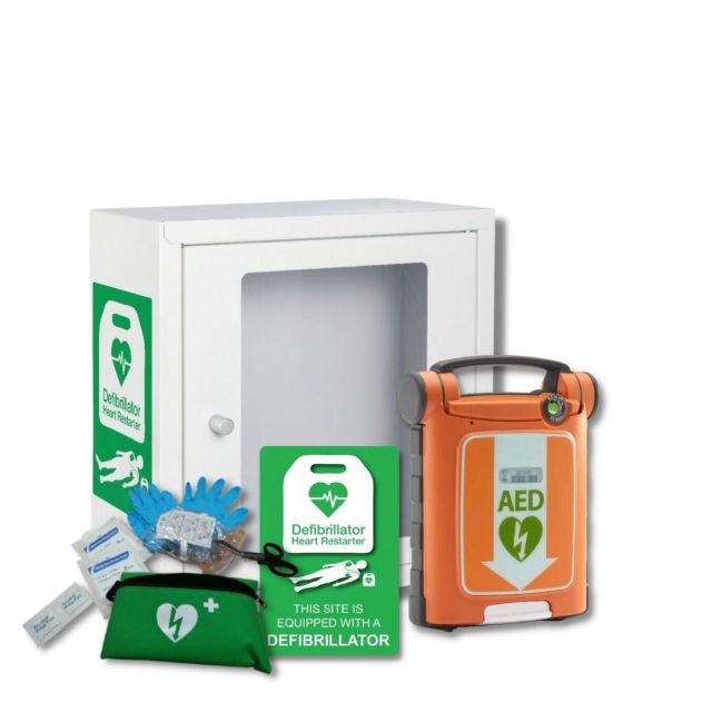 Indoor white metal, alarmed defibrillator cabinet with large viewing window, next to cardiac Science G5 Defibrillator next to Defib Store Rescue Ready Kit and Indoor Defibrillator Wall Sign