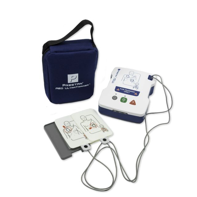 Prestan AED Ultra Training Defibrillator. A white, rectangular box with two wired electrode pads attached, and a blue fabric carry case with carry handdle.