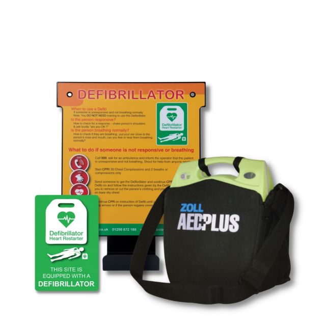 Defib Store Indoor Wall Hanger with the chain of survival detailed on the front and instructions on what to do in a cardiac emergency, next to a ZOLL AED Plus Soft Carry Case in black, with 'ZOLL AED Plus' written on the front and a carry strap and indoor