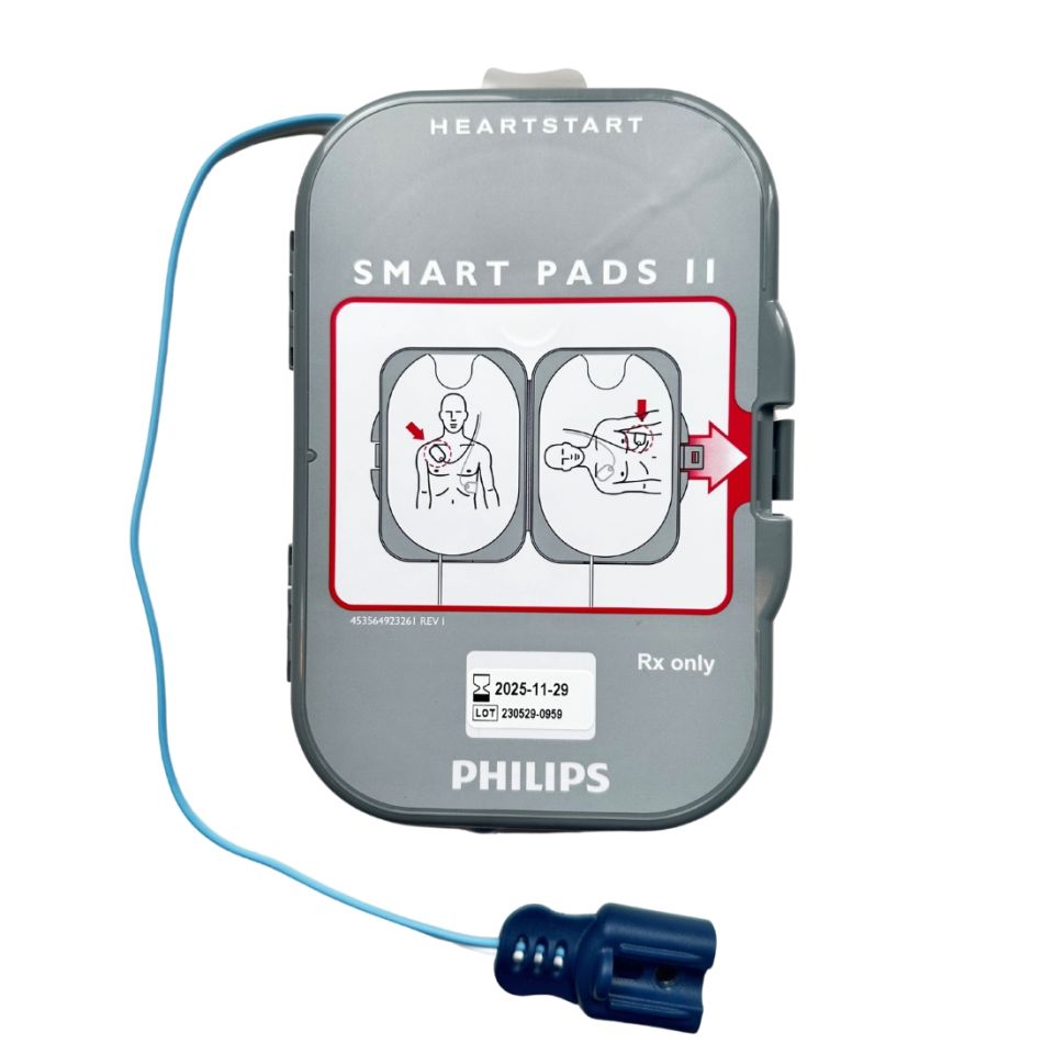 Philips Heartstart SMART electrode defibrillator pads with graphics showing pad placement on adult patient