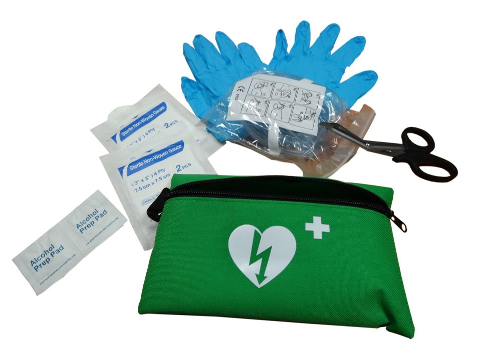 Green material zippered bag open showing nitrile gloves, tough cut scissors, razor, alcohol wipes, gauze and a CPR Mask
