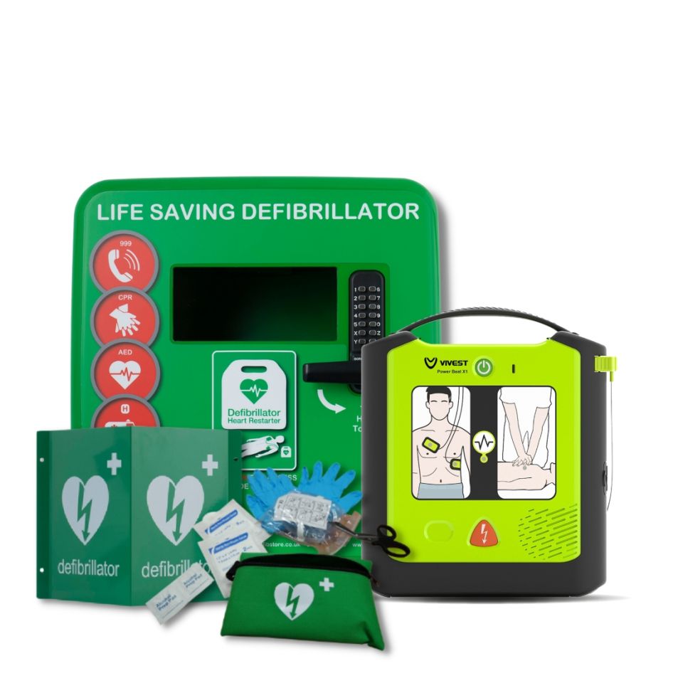 Defib Store 4000 Locked Defibrillator Cabinet alongside ViVest Power Beat X1 Semi-Automatic Defibrillator, a 3D Defibrillator wall sign and a rescue ready kit with nitrile gloves, tough cut scissors and accessories to help with sudden cardiac arrest