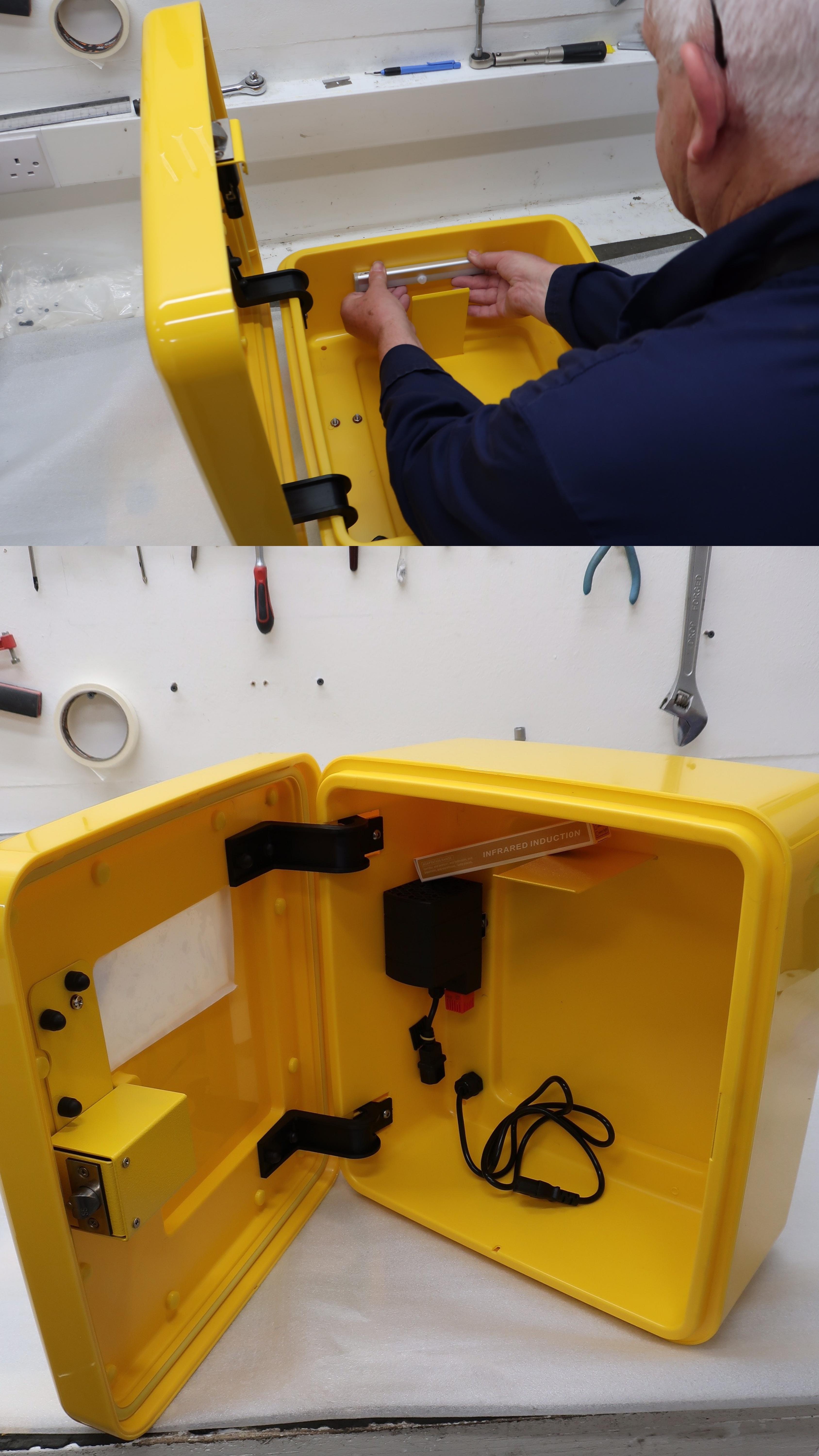 Defibstore cabinet being prepared for dispatch Defibstore team member wrapping AED cabinet in protective packaging at Derbyshire facility